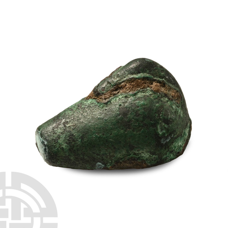 Circa 7th-6th century B.C.. Modelled in the round with the head resting along th...