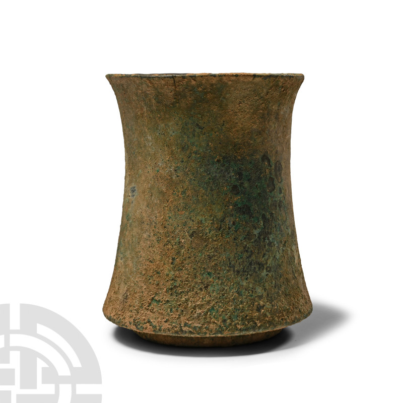 2nd-1st millennium B.C.. Tubular with slightly flared rim and expanding towards ...