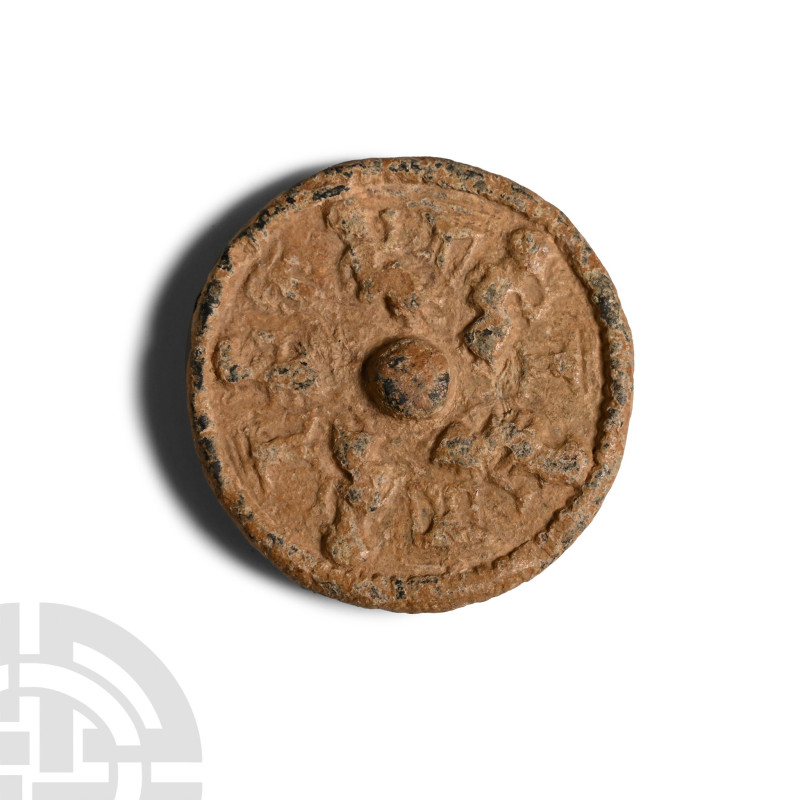 1st century B.C.-2nd century A.D.. Discoid with rolled rim, central boss and fri...