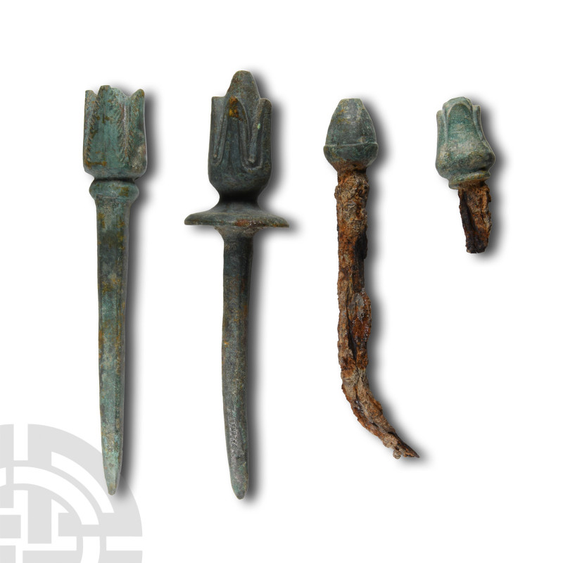 6th-4th century B.C.. Including two small buds with ferrous spikes and two large...