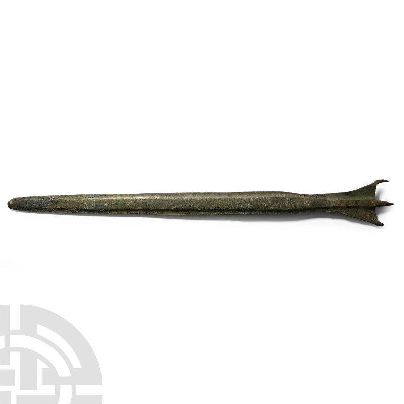 Late 2nd-1st millennium B.C.. A bronze dagger blade with prominently curved guar...