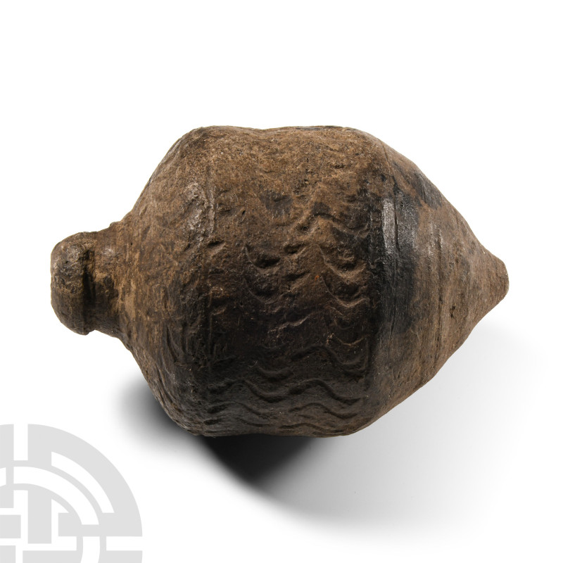 9th-11th century A.D.. With domed filler-hole, broad shoulder, alternating bands...