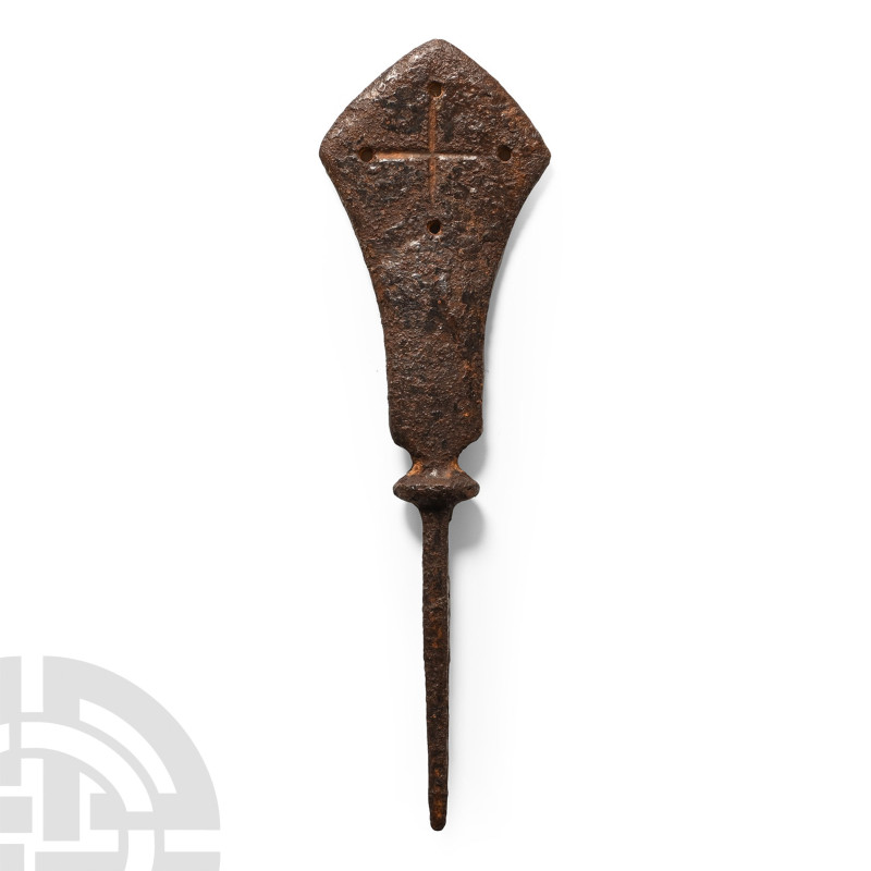 Circa 12th-14th century A.D.. The wide blade with an incised cross motif, pierce...