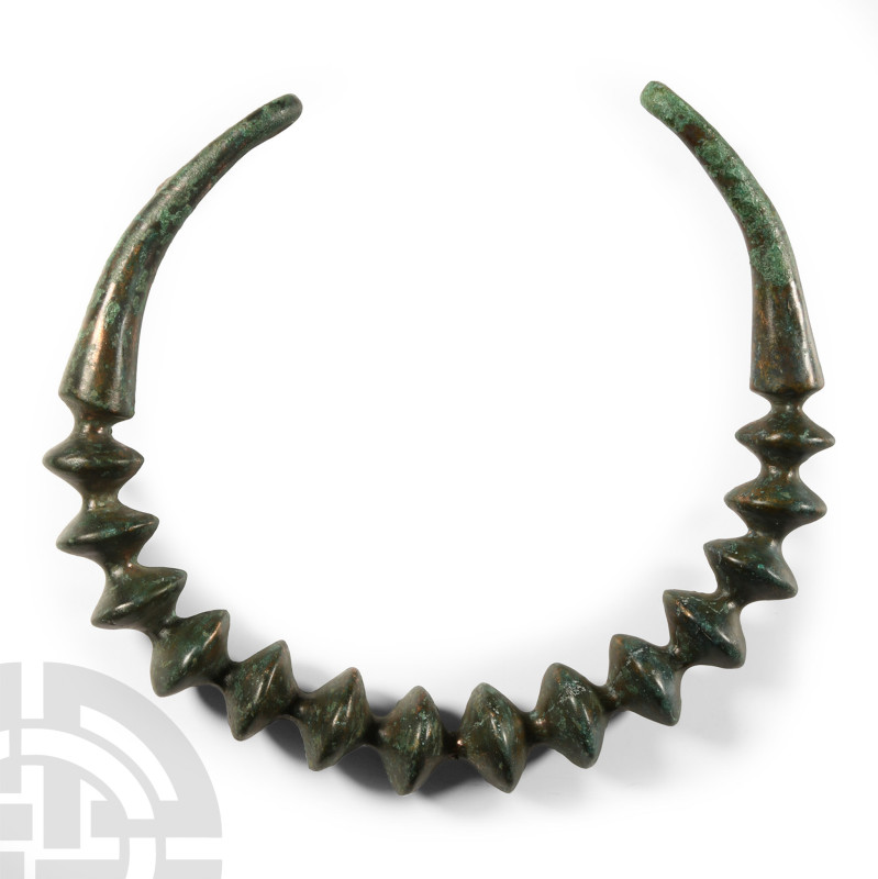 Circa 3rd-2nd century B.C.. The penannular body formed with graduated biconical ...