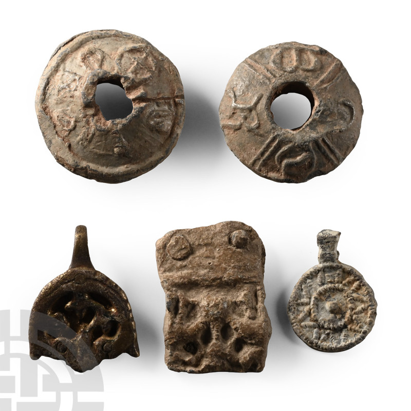 6th-11th century A.D.. Including three biconvex spindle whorls with low-relief d...