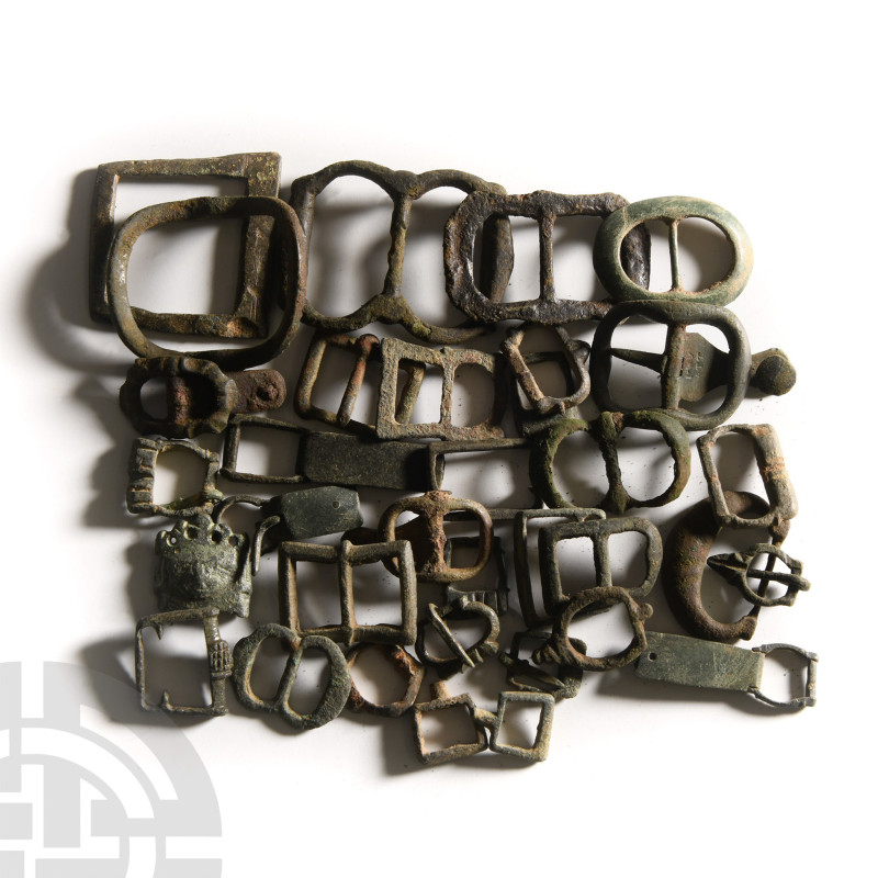 12th-16th century A.D.. Mixed group of buckles and buckle loops, some with mount...