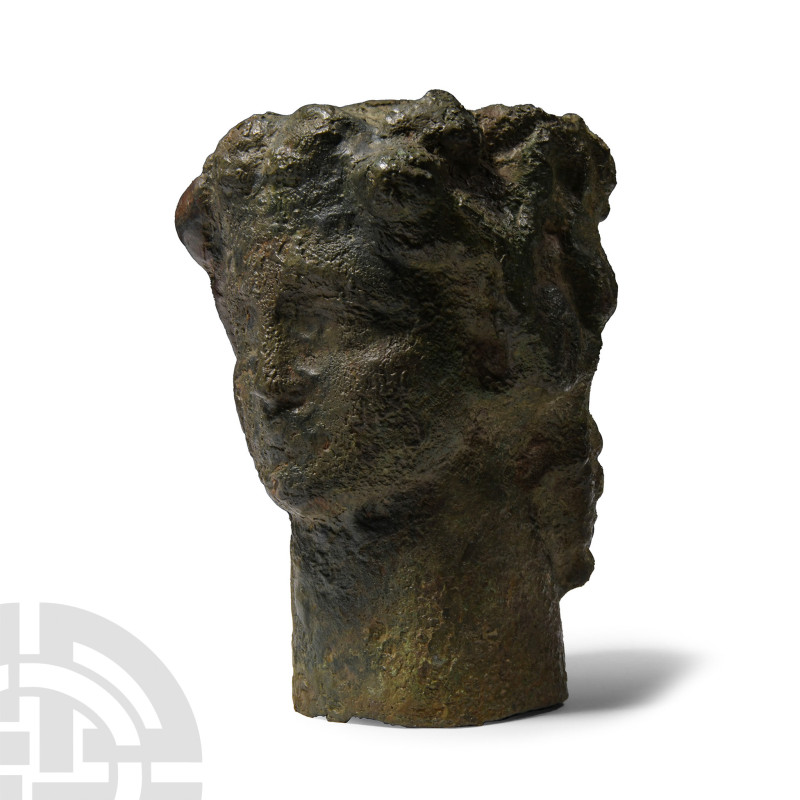 20th century A.D. or earlier. Hollow-formed janiform bust with wreath to the bro...