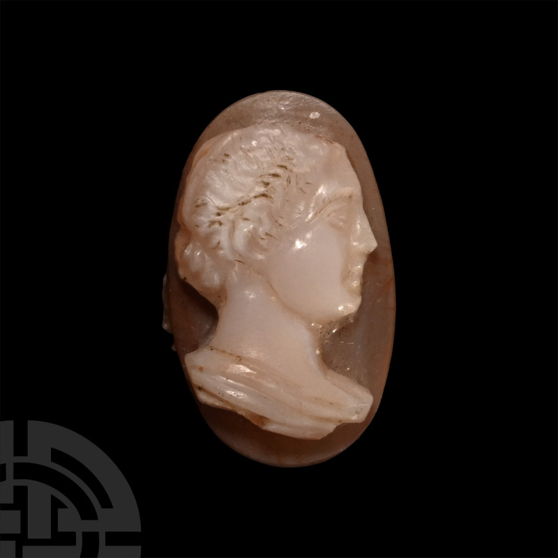 19th century A.D.. Ellipsoid with reserved profile female bust, hair dressed in ...