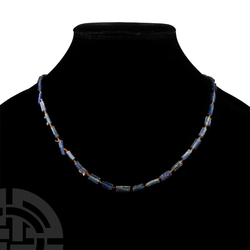 20th century A.D. or earlier. Restrung; composed of translucent blue glass beads...