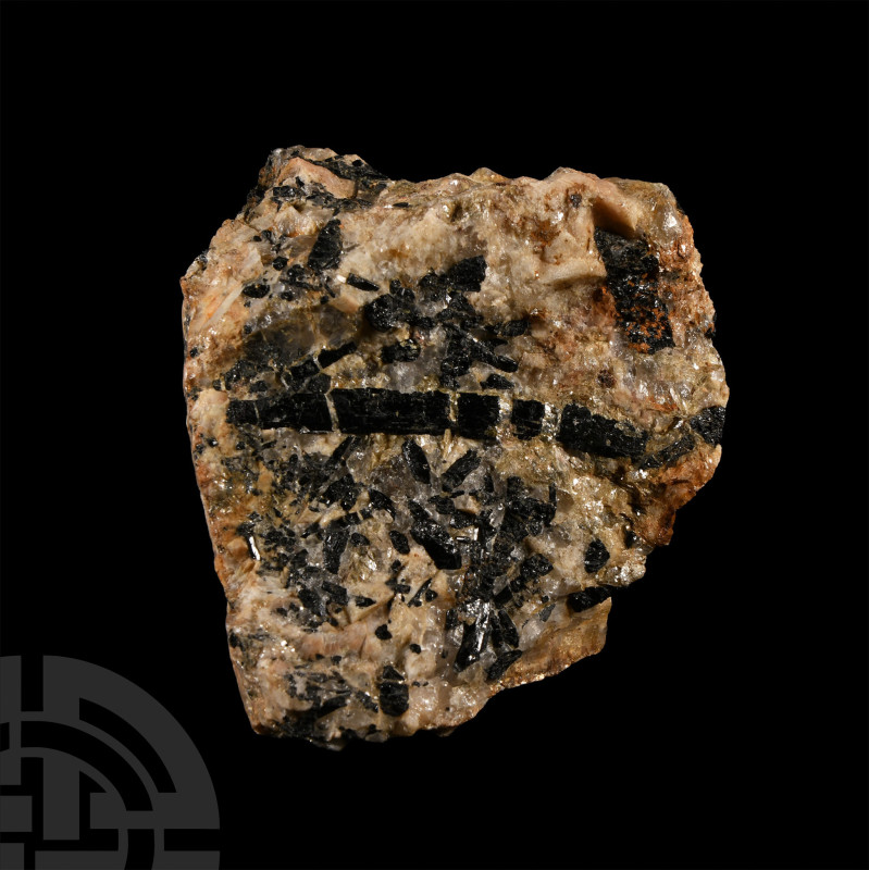 Black variety of tourmaline embedded in mica rich matrix, collection number 100....