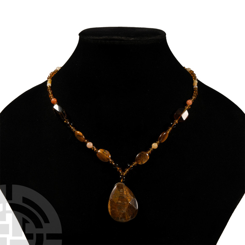 20th century A.D.. Featuring quartz or agate beads, biconical glass beads and ov...