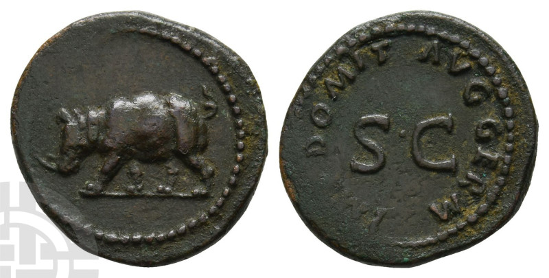 Domitian AE Quadrans. AD 81-96. Rhino standing to left / IMP DOMIT AVG GERM arou...