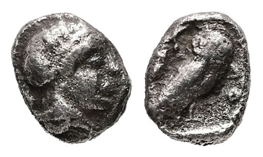 Attica, Athens. AR Hemiobol, 0.28 g 6.18 mm. Circa 454-404 BC.
Obv: Helmeted hea...