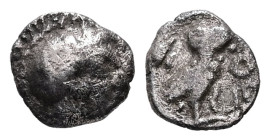 Attica, Athens. AR Hemiobol, 0.30 g 7.05 mm. Circa 454-404 BC.
Obv: Helmeted head of Athena right.
Rev: AΘΕ, Owl standing right, head facing; olive sp...