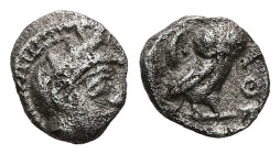 Attica, Athens. AR Hemiobol, 0.30 g 7.17 mm. Circa 454-404 BC.
Obv: Helmeted head of Athena right.
Rev: AΘΕ, Owl standing right, head facing; olive sp...