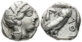 Attica, Athens. AR, Tetradrachm. 16.78 g. - 24.49 mm. Circa 454-404 BC.
Obv.: Head of Athena to right with almond-shaped profile eye, wearing crested ...