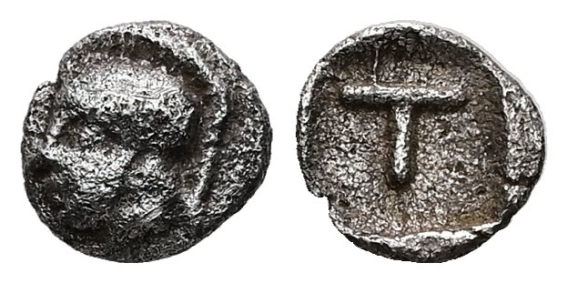 Arkadia, Tegea. AR Tetartemorion. 0.17 g 6.48 mm. Circa 423-400 BC.
Obv: Helmete...