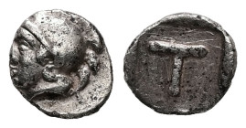 Arkadia, Tegea. AR Hemiobol, 0.22 g 6.89 mm. Circa 423-400 BC.
Obv: Helmeted head of Athena left.
Rev: Large T within shallow incuse square.
Ref: HGC ...