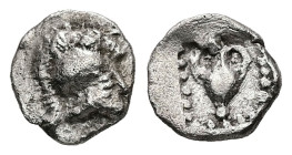 Asia Minor, Uncertain (perhaps Neandria in Troas?). AR Hemiobol, 0.26 g 7.19 mm. 5th century BC. 
Obv: Crested Corinthian helmet right 
Rev: Amphora w...