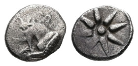Asia Minor,Uncertain.[Ionia?]. AR Hemiobol, 0.26 g 7.67 mm.Circa 500-420 BC.
Obv: Forepart of goat left
Rev: Star of eight rays within incuse square.
...