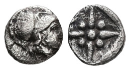 Asia Minor. Uncertain mint. AR, Hemiobol, 0.34 g 7.37 mm. Circa 500-400 BC.
Obv: Helmeted head of Athena right.
Rev: Star of four rays, pellets betwee...