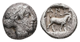 Troas, Antandros. AR Obol, 0.59 g 8.14 mm. Circa 360-350 BC.
Obv: Head of Artemis Astyrene right.
Rev: ANTA / N, Goat standing right within incuse squ...