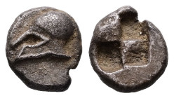 Troas, Neandria. AR, Obol. 0.63 g. - 8.11 mm. Late 6th - 5th century BC.
Obv.: Corinthian helmet to left.
Rev.: Quadripartite incuse square. 
Ref: Ros...