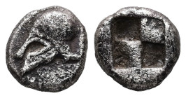 Troas, Neandria. AR, Obol. 0.68 g. - 8.07 mm. Late 6th - 5th century BC.
Obv.: Corinthian helmet to left.
Rev.: Quadripartite incuse square. 
Ref: Ros...