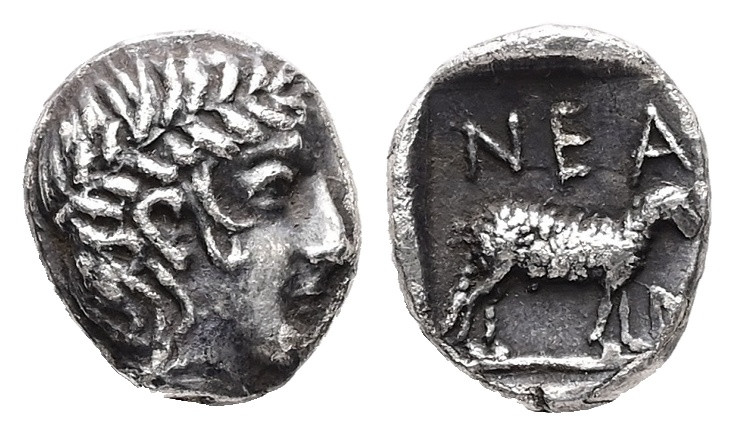 Troas, Neandria. AR, Hemiobol. 0.58 g. - 8.88 mm. 4th century BC.
Obv.: Laureate...