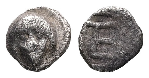 Ionia, Kolophon. AR Tetartemorion, 0.16 g 6.11 mm. Circa 450-410 BC. 
Obv: Head ...