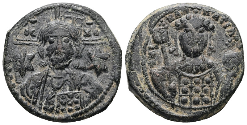 Michael VII Ducas, AD 1071-1078. AE, Follis. 8.68 g. 26.74 mm. Constantinople.
O...