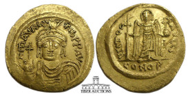 Maurice Tiberius. 582-602. AV Solidus (21 mm, 4.47 g). Constantinople mint. Helmeted, draped, and cuirassed bust facing, holding globus cruciger / Ang...