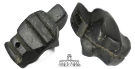 Near East. Circa 1st Millennium BC. Amulet, stylized turtle. Black steatite or limestone. 30 mm x 20 mm x 12 mm. 10.97 g.