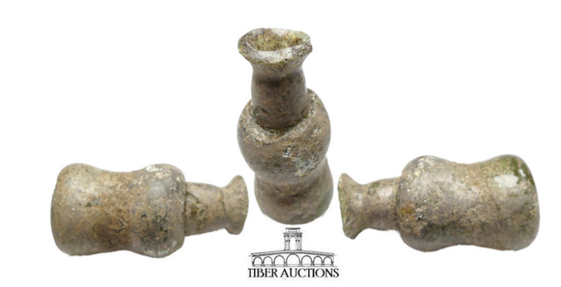 Roman. Circa 1st-4th Century AD. Bottle. Glass. 52 mm x 25 mm. 32.84 g.