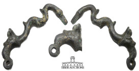 Roman. Circa 1st-4th Century AD. Handle with griffin head and body. Cast bronze. 92 mm x 32 mm x 5mm. 43.45 g.