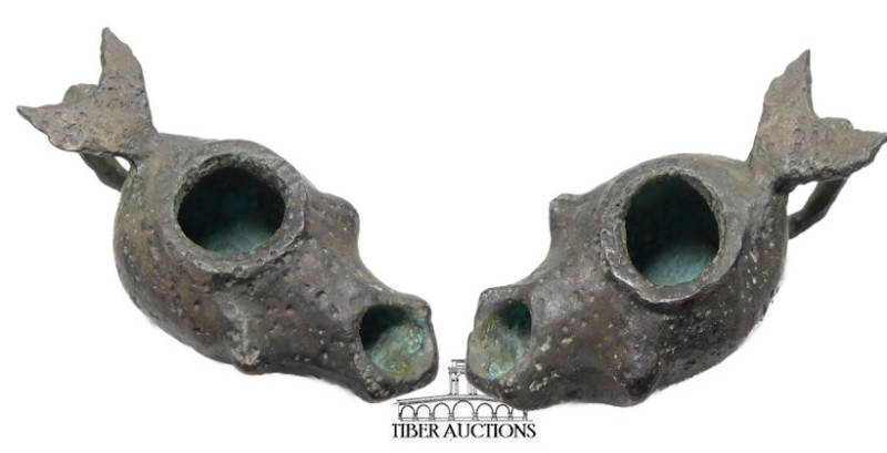 Roman. Circa 1st-4th Century AD. Lamp with leaf handle. Bronze. 65 mm x 30 mm x ...