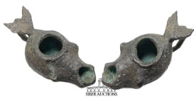 Roman. Circa 1st-4th Century AD. Lamp with leaf handle. Bronze. 65 mm x 30 mm x 17 mm. 45.14 g.
