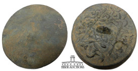 Islamic. Circa 1037-1194. Mirror with Arabic script and stylized figures. Most likely Seljuk. Bronze. 63 mm x 5 mm. 49.92 g.