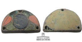 Unknown origin, attributed in collection as East Europe, Circa 5th-7th Century AD. Pendant. Glass and ceramic. 27 mm x 20 mm x 3 mm. 5.96 g.