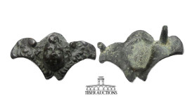 Unknown origin, attributed in collection as Medieval Europe, Circa 11th-14th Century AD. Applique decorated with cherub. Cast bronze. 42 mm x 25 mm x ...