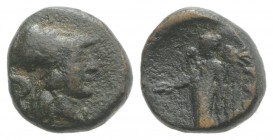 Southern Apulia, Rubi, c. 300-222 BC. Æ (11mm, 2.11g, 9h). Head of Athena l., wearing crested Corinthian helmet. R/ Nike l. holding patera and palm. H...