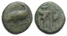 Bruttium, Kroton, c. 375-325 BC. Æ (13mm, 3.07g, 6h). Eagle standing r., head reverted, on cross-torch. R/ Tripod; to r., heron standing r. HNItaly 22...