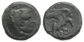 Bruttium, Kroton, c. 350-300 BC. Æ (18mm, 6.82g, 9h). Head of Herakles r., wearing lion skin. R/ Eagle r., alighting on snake. HNItaly 2218; SNG ANS 4...
