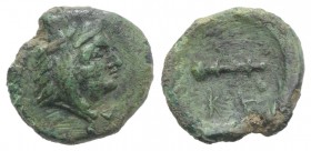 Bruttium, Kroton, c. 350-300 BC. Æ (11mm, 1.14g, 9h). Head of Herakles r., wearing lion skin. R/ Club. Cf. HNItaly 2227; SNG ANS -. Green patina, VF