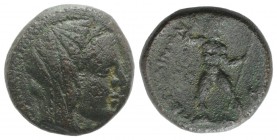Bruttium, Petelia, late 3rd century BC. Æ (19mm, 7.36g, 1h). Veiled head of Demeter r., wearing wreath of grain ears. R/ Zeus standing facing, head r....