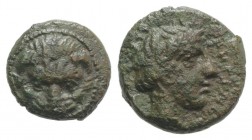 Bruttium, Rhegion, c. 415/0-387 BC. Æ (11mm, 1.89g, 5h). Facing lion's scalp. R/ Laureate head of Apollo r. HNItaly 2524; SNG ANS 698-701. About VF