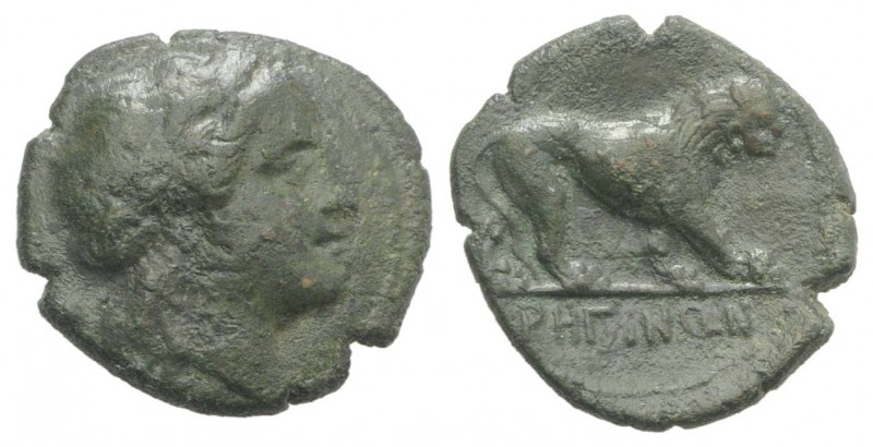 Bruttium, Rhegion, c. 260-215 BC. Æ (15mm, 2.61g, 3h). Head of Apollo r. R/ Lion...