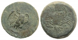 Sicily, Akragas, c. 415-406 BC. Æ Hemilitron (27mm, 16.67g, 7h). Eagle standing r. on tunny. R/ Crab; conch shell and octopus below, six pellets aroun...