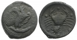 Sicily, Akragas, c. 415-406 BC. Æ Hemilitron (29mm, 21.17g, 11h). Eagle standing r. on tunny. R/ Crab; conch shell and octopus below, six pellets arou...