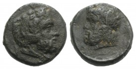 Sicily, Gela, c. 315-310 BC. Æ (15mm, 4.53g, 6h). Bearded head of Herakles r., wearing lion-skin. R/ Bearded and horned head of Gelas l. CNS III, 55; ...